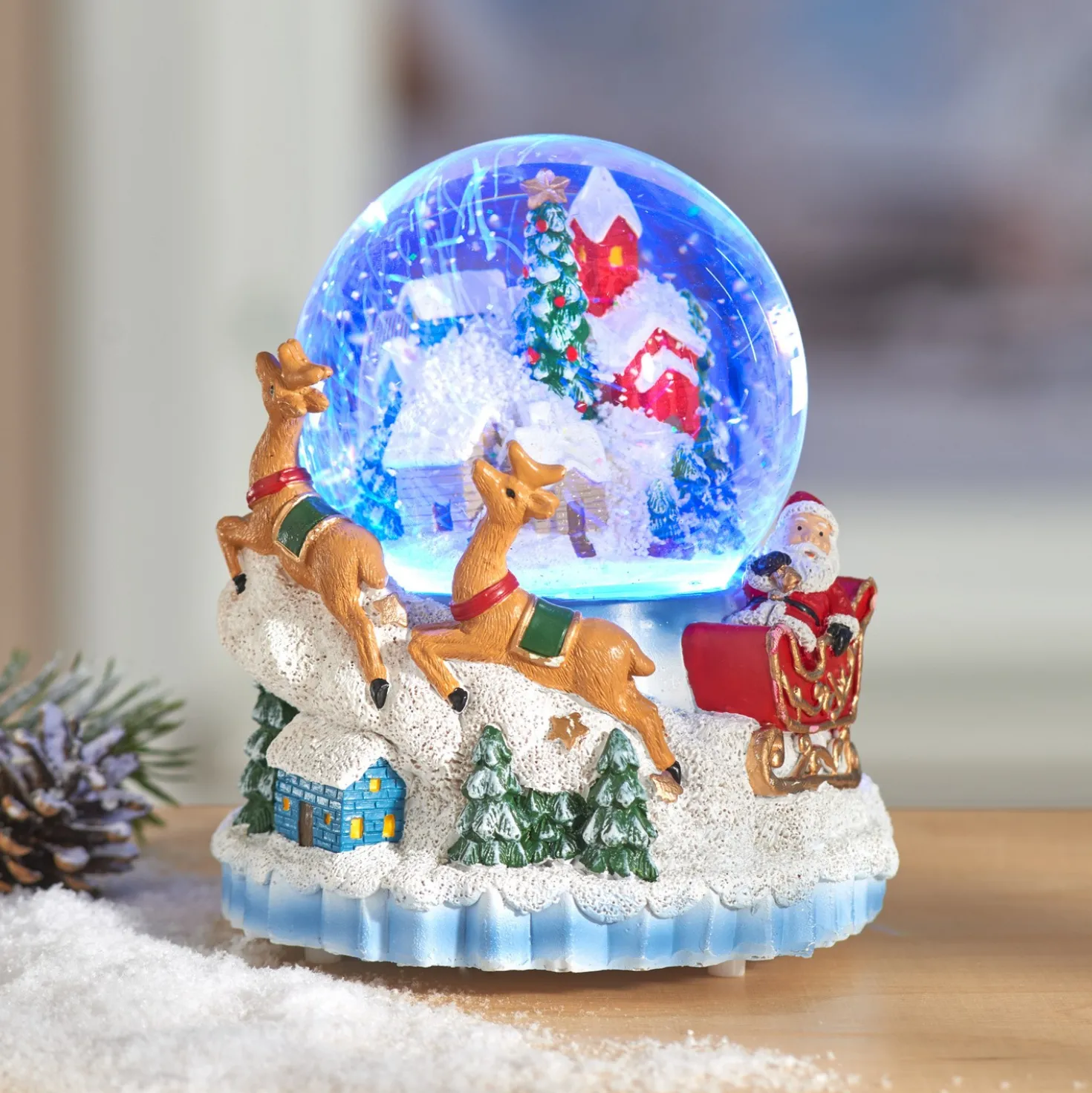 LED-Schneekugel mit Musik